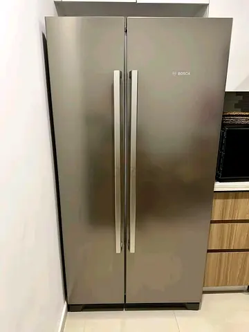 Bosch Side-by-Side Refrigerator - Good Condition, Stainless Steel Finish