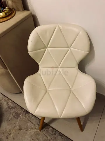 White faux leather dining/side chair with wooden legs