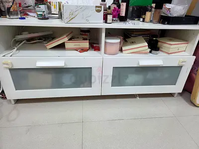White low TV unit / media console with frosted glass doors - good condition