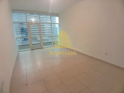 Modern 1BHK with Balcony & Parking in Rawdhat – AED 75,000