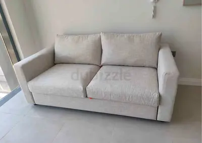 Light 2-seater sofa bed in good condition