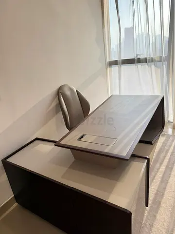 Modern executive office desk with matching storage cabinet and chair