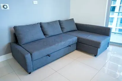 Modern Gray L-Shaped Sofa Bed with Pull-Out Section