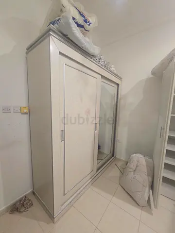 Large Beige Sliding Door Wardrobe with Mirror