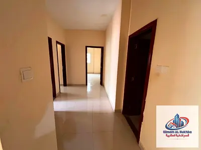 Two-bedroom apartment with a living room and balcony in Al-Qulai'a. Features include two master bedrooms, a spacious living room, an excellent kitchen
