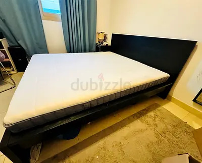 IKEA King size wooden bed frame with IKEA mattress - good condition