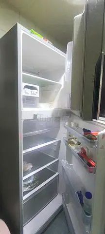 double-door refrigerator in good working condition
