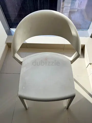 Modern white plastic lounge chair — used, sturdy design