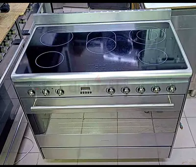 Smeg stainless steel electric range with ceramic hob and oven