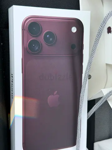 Brand new iPhone 18 Promax 1 Tb burgundy never open with Apple warranty