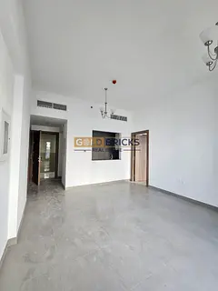 1BR Apartment | International City Phase 2 | Downtown View
