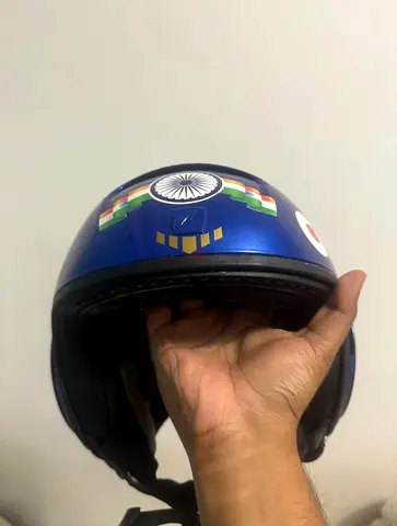 Used blue open-face helmet with Indian flag stickers - good condition