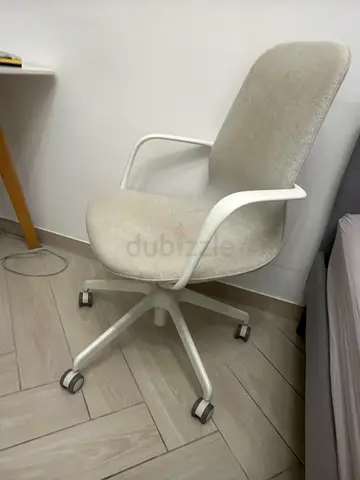 White swivel office chair on wheels - light beige fabric, good condition