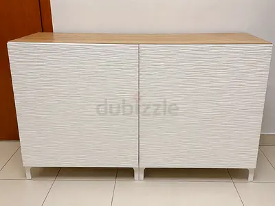 White textured 2-door storage cabinet