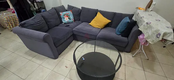 Used L-shaped grey fabric corner sofa - 4 seater