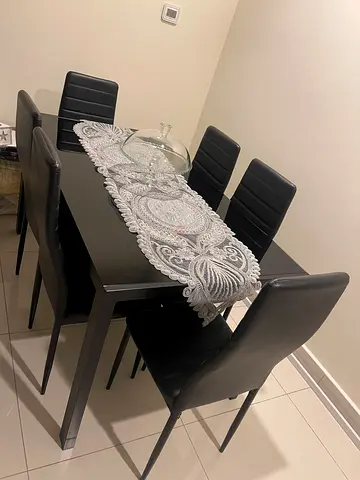 Black 6-Seater Dining Table with Leather Chairs