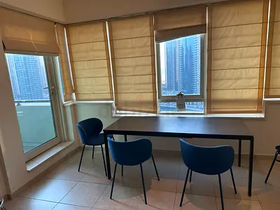 Dining extendable table with four blue upholstered chairs - good condition