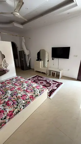 Spacious studio with a separate kitchen; all bills included; located at the Dubai exit.
