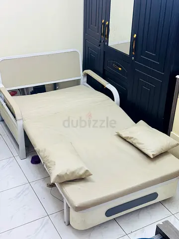 Single metal frame guest bed with mattress - good condition foldable