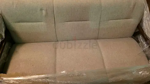 Light beige 3-seater fabric sofa in good condition