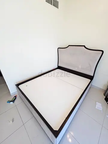 Beautiful bed in great condition. Fabric + wood. Very clean. No stains or scratches.