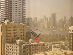 Sea View for a Beautiful Two-Bedroom Apartment with the Lowest Price in Al Majaz 1 Large Space and B