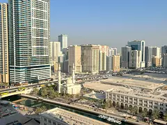 One-Bedroom Apartment in Al Qasba | High Floor | Sea View | Free Gym, Pool, AC & Maintenance