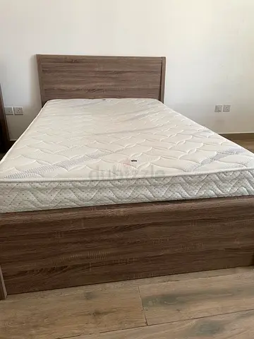 Wooden twin size bed with mattress in Excellent  Condition!