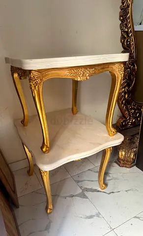 Free delivery near Pair of vintage-style nesting side tables with gold carved legs