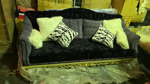 3-seater velvet sofa with decorative cushions and gold trim