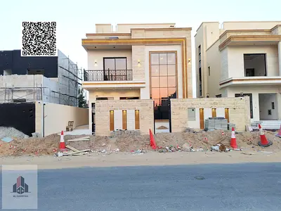 Villa with stone façade for sale; price includes registration and ownership transfer fees.