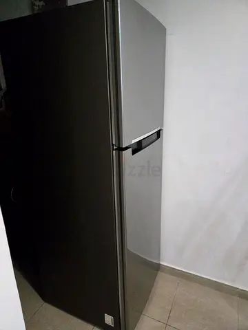 Used large silver double-door refrigerator - good condition