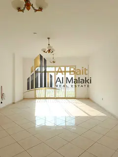 Elegant Family Apartment for Annual Rent in Al Majaz with Two Balconies