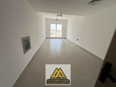 Brand New (1st Tenant) 1 BHK Apartment for Rent in Al Tallah 2, Ajman | Next to Saudi German Hospital | Built-in Wardrobes | Central AC | Balcony | AE