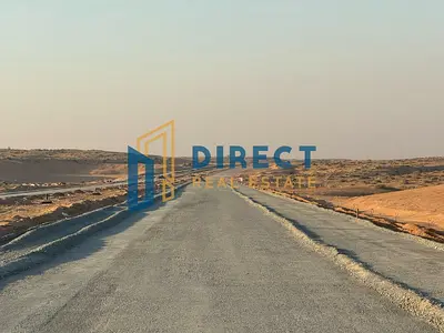 Prime corner industrial plot in Al Sajaa – Freehold | Large area at a competitive price.