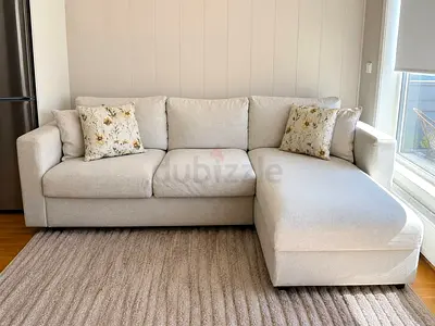 Light beige L-shaped 3-seater sofa with chaise lounge