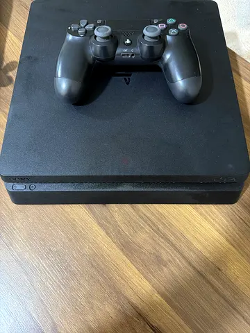 PlayStation 4 Slim with DualShock 4 Controller - Perfect Condition