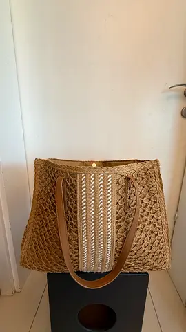 woven straw bag with leather handles