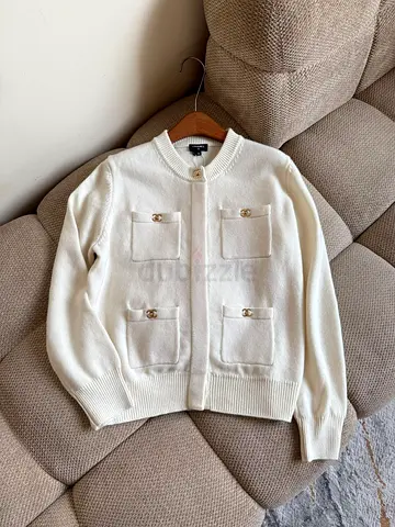 Cream knit cardigan with gold-tone logo buttons, size likely S