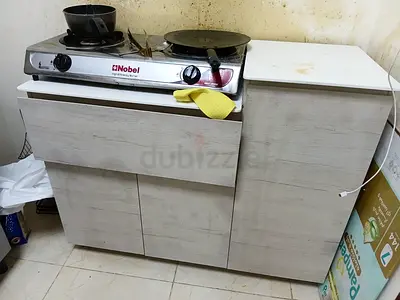 Compact kitchen cabinet with countertop and storage - light wood finish