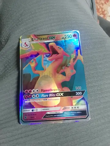 Rare Charizard GX Holographic Pokémon Card - Good Condition