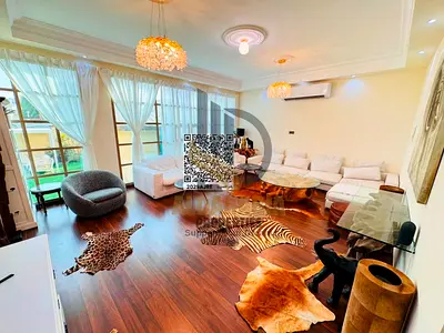 An architectural masterpiece radiating royal luxury in the heart of Ajman! A distinctive, upscale, and modern smart villa with luxury hotel furnishin