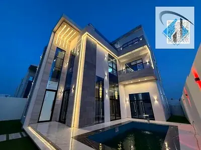 Luxury villa for sale in one of Ajman's most prestigious areas. 5000 sq ft building with elevator, swimming pool, electricity, water, air conditioning