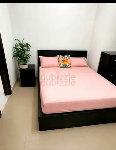 IKEA queen size bed with mattress and storage drawers