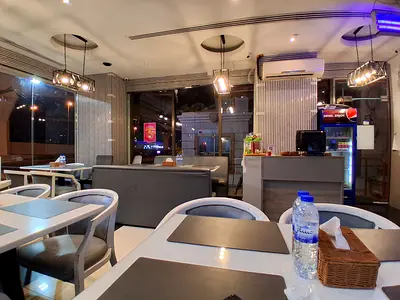 WELL RUNNING INDIAN RESTAURENT AT PRIME LOCATION KARAMA DUBAI FOR SALE. LICENCE VALID TILL 2027
