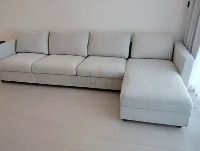 Light grey L-shaped 4-seater sofa with chaise (good condition)