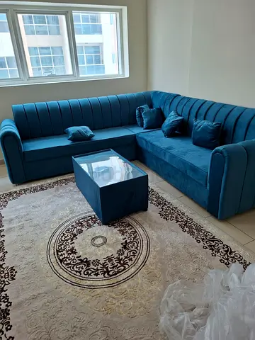 Get the best price of brand new L shape sofa Premium Quality with pillows and table
