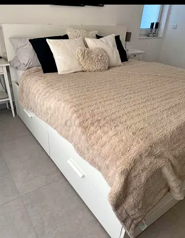 IKEA king size bed with mattress and storage drawers