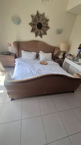 Queen size upholstered bed frame with headboard and storage