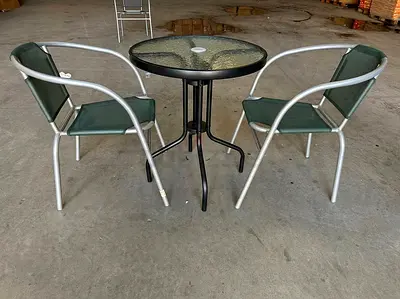 Outdoor bistro set - glass top table with two green sling chairs